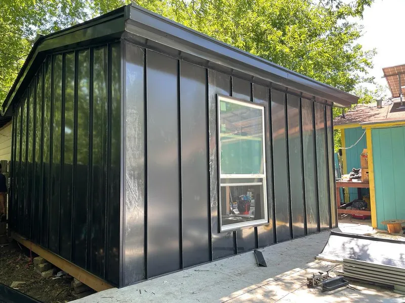 Black standing seam metal wall panels for Roof Inspection in Marathon