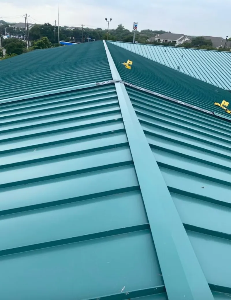 Green commercial metal roof ridge and valley for Metal Roof Repair in Marathon